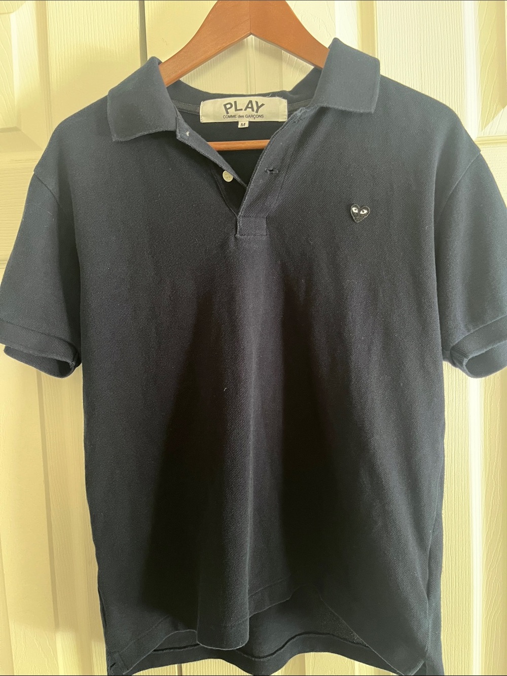 Comme des Garçons PLAY Navy Polo with Embroidered Heart